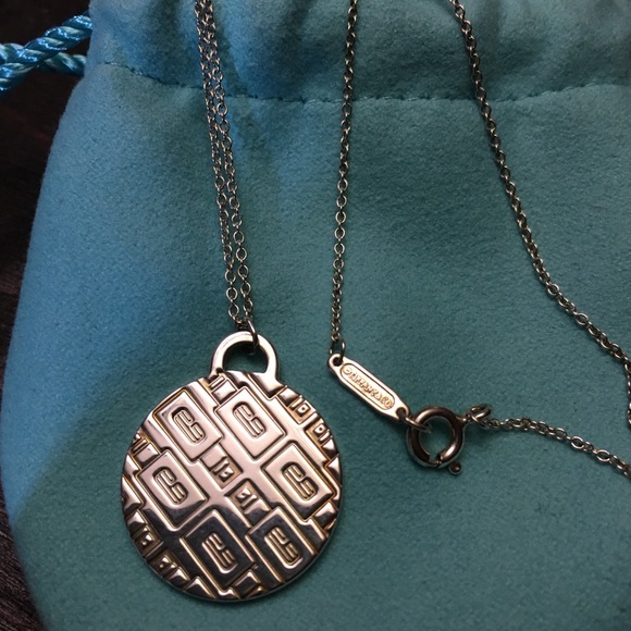 Tiffany & Co. Jewelry - Authentic Tiffany & Co 45 years Clinique pendant